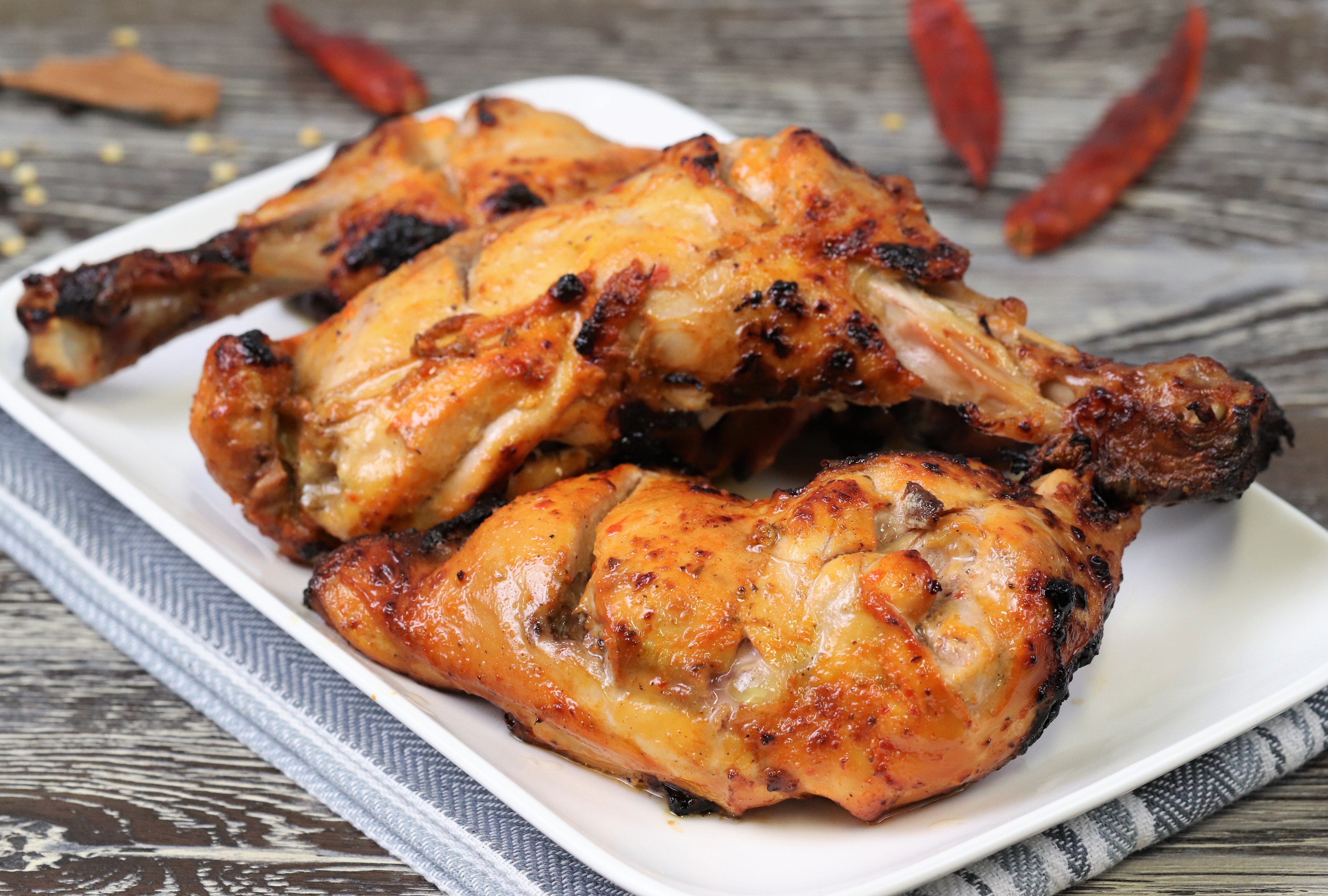 Tandoori Chicken - Clay oven roasted chicken with aromatic spices